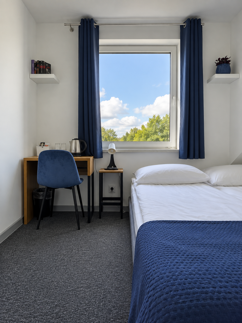 Doppelzimmer mit Kingsize-Bett